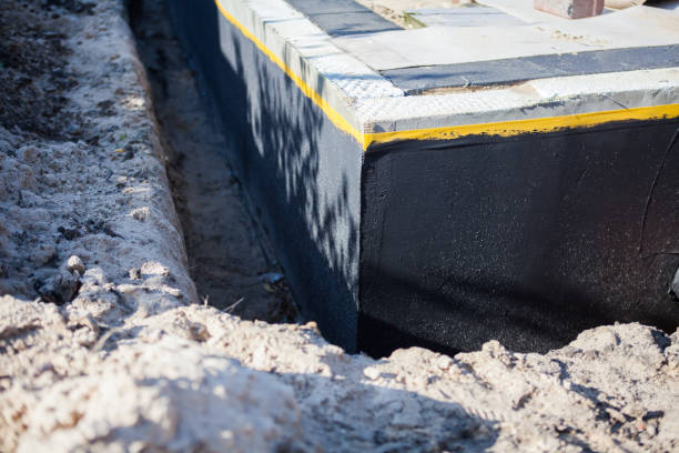 Professional Basement Waterproofing technician working in Neshkoro, WI